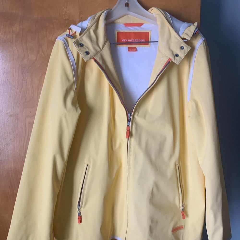 Weatherproof Yellow Ski Jacket with Hood and Water-Resistant Fabric